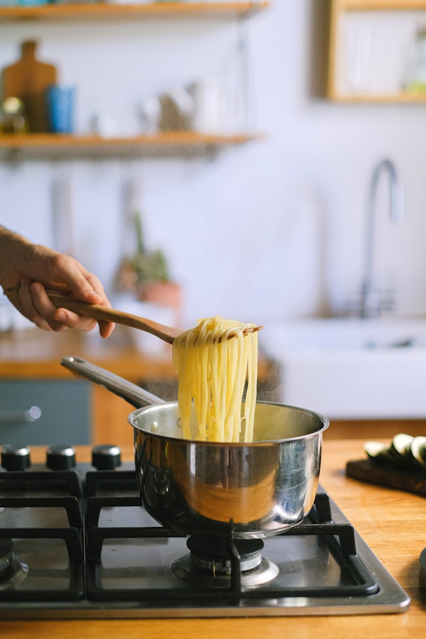 Spaghetti cooking in water